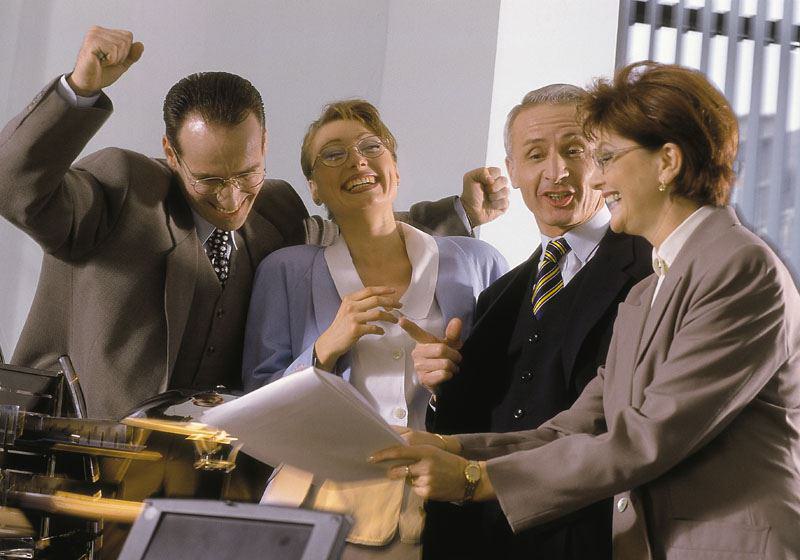 Teamarbeit im Coaching Das Bild zeigt Erfolg und Teamarbeit im Beruf.