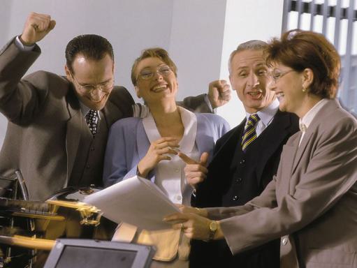 Das Bild zeigt Erfolg und Teamarbeit im Beruf.